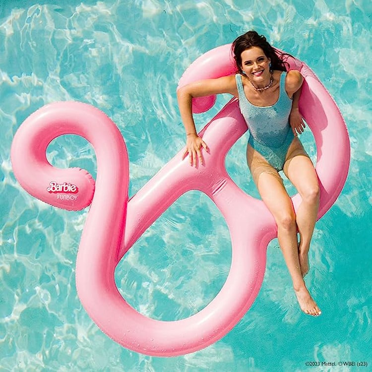 Woman on a Barbie pool float