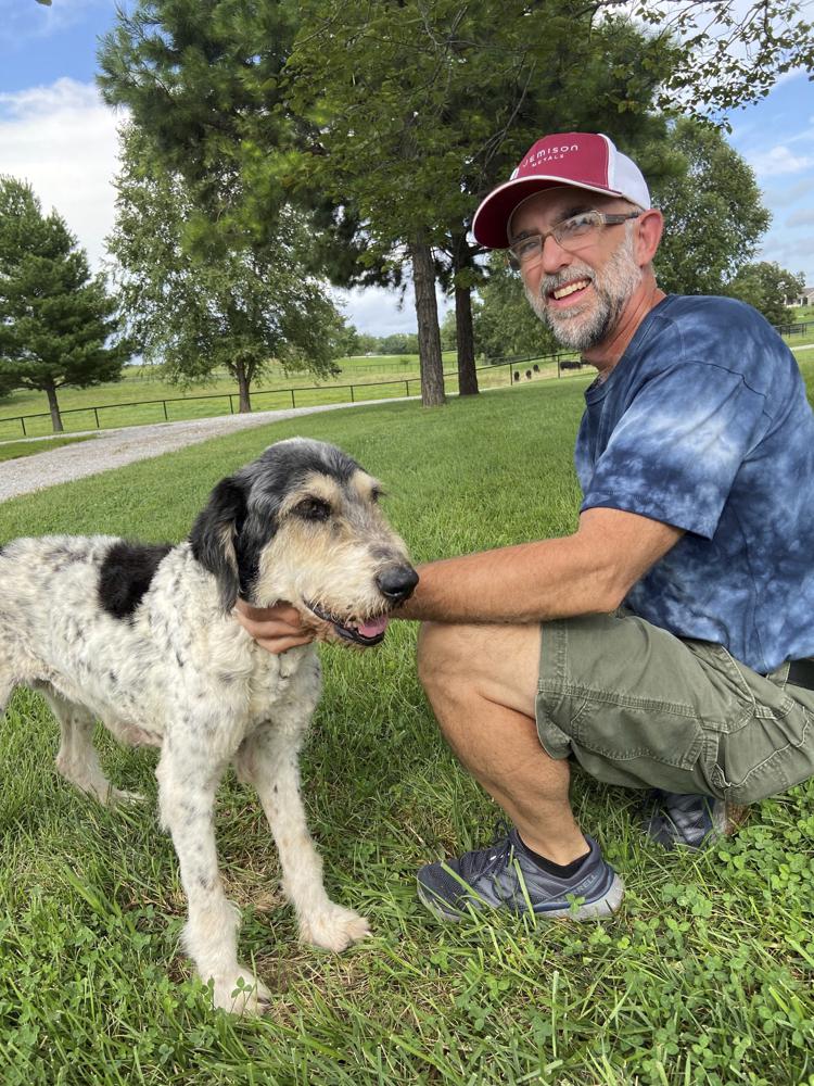 13-year-old dog Abby with her owner Jeff Bohnert