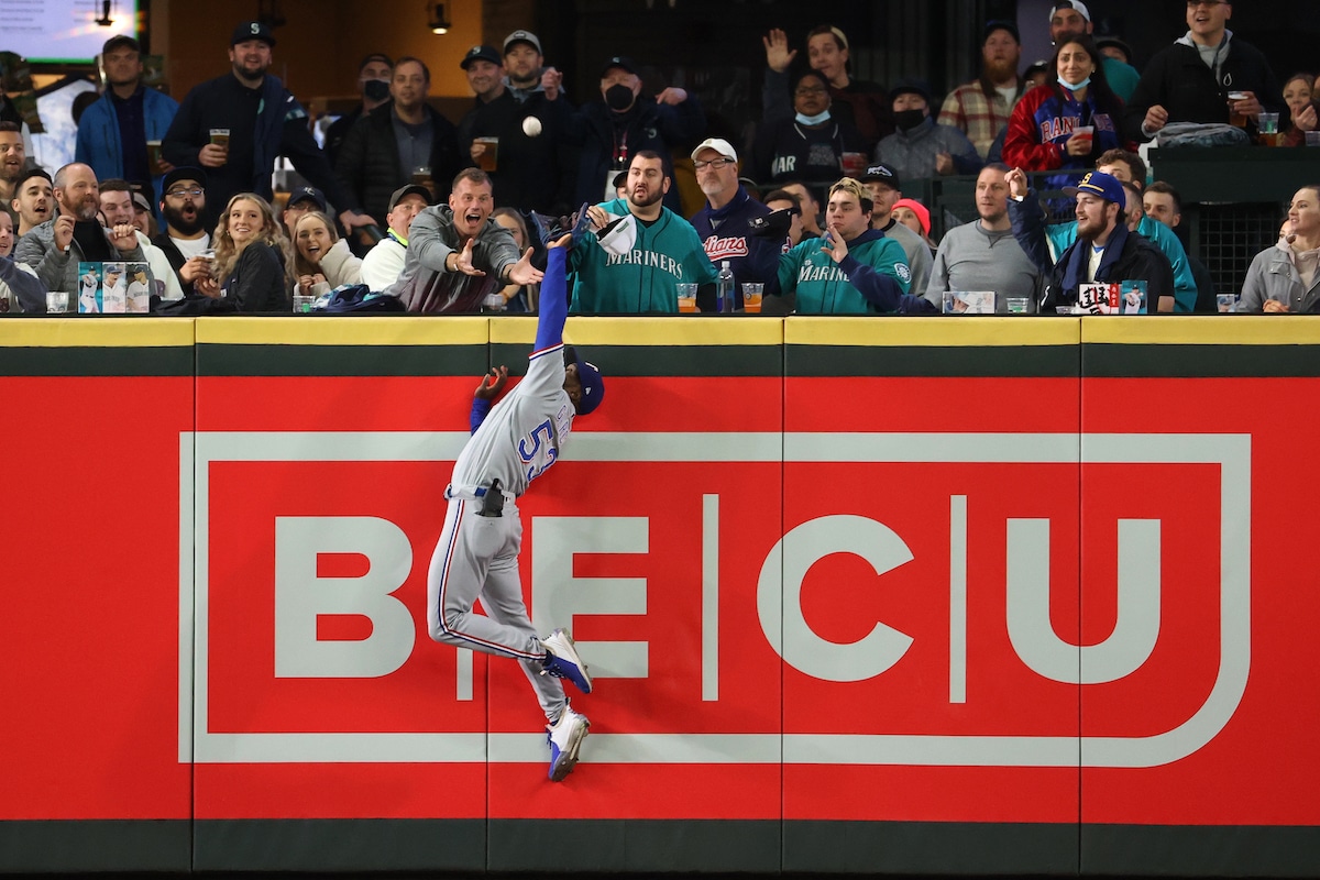 Adolis Garcia Jumping to Catch a Ball