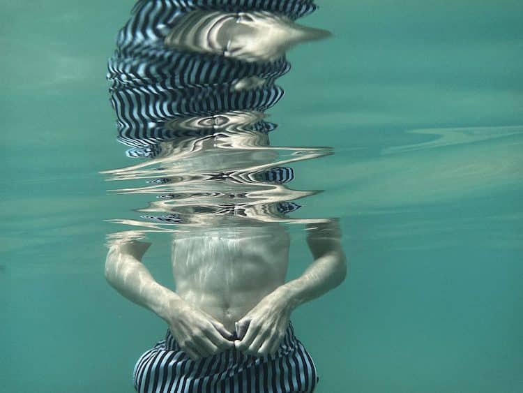 iPhone Photo of Boy Underwater
