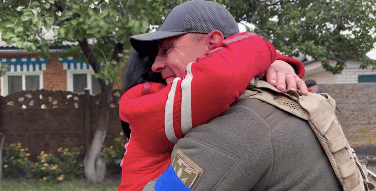 Mother Embracing Her Son Who is a Ukrainian Soldier
