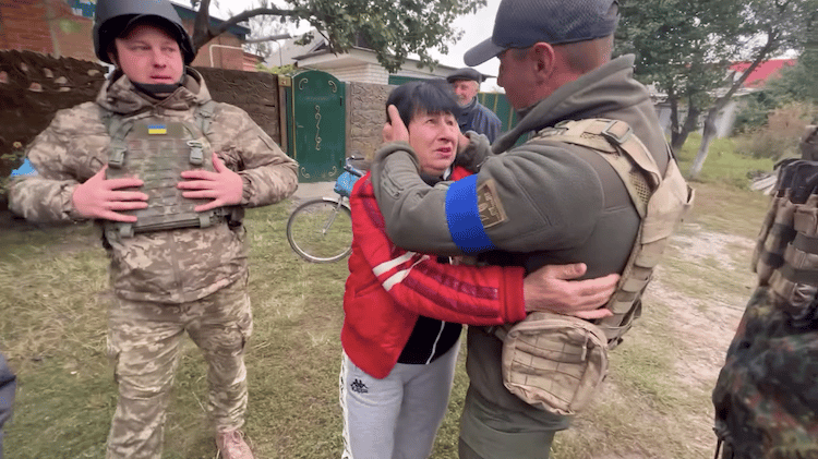 Ukrainian Mom Rushing to Greet Her Son Returning from the War