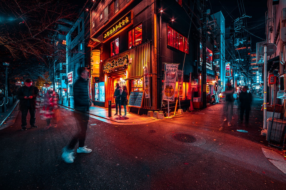 Man Walking on the Streets of Kyoto at Night