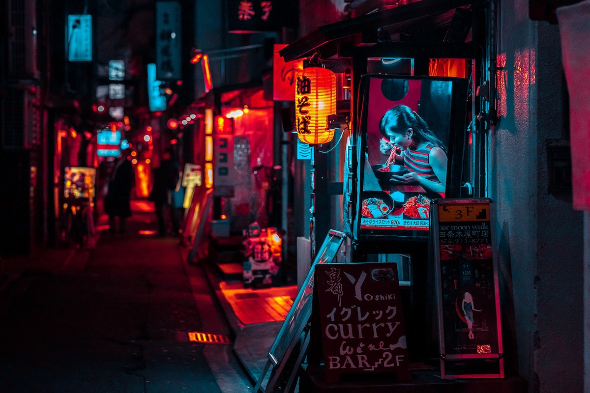 Girl Eating Noodles at Night in Kyoto