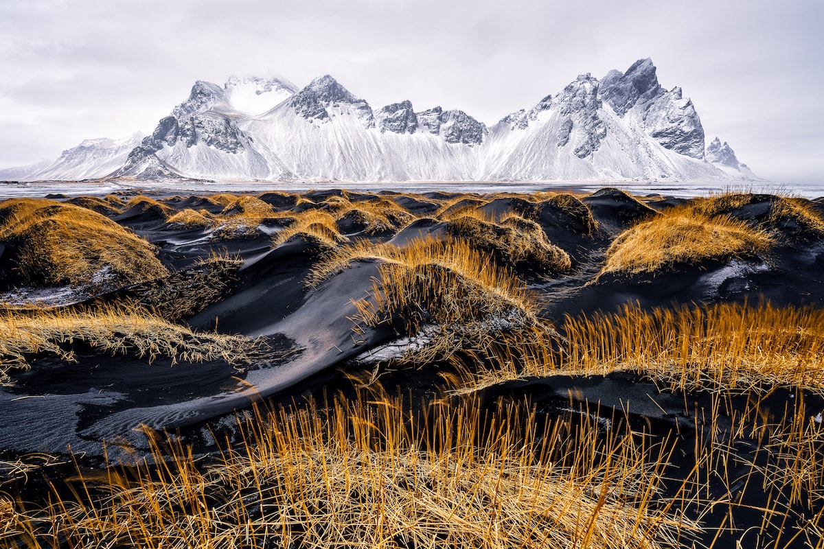 Winter in Stokksnes in the beach with black sand and the majestic mountain called Vestrahorn