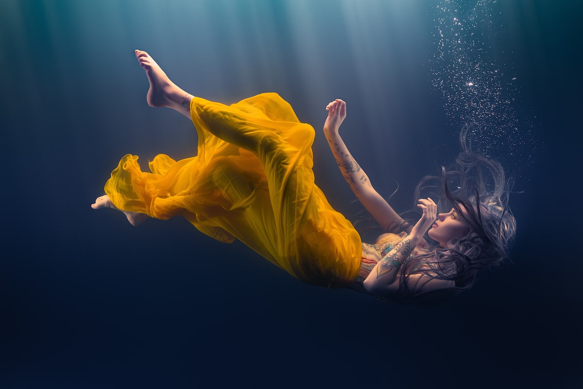 Model in Yellow Dress Underwater