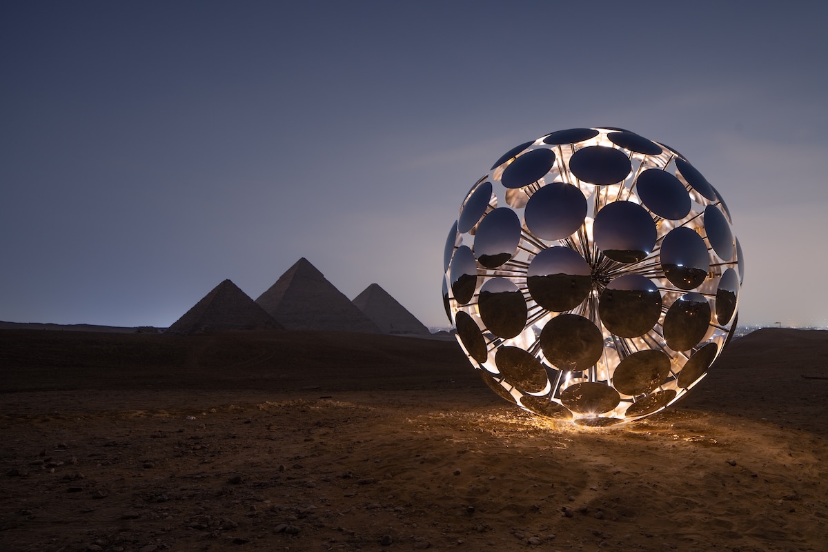 SpY Art Installation at Night in Front of the Pyramids              in Giza