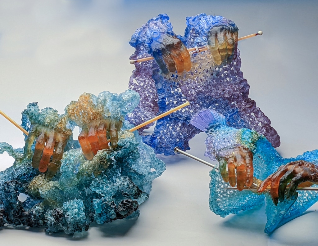 Glass Sculptures of Hands Knitting Themselves Celebrate the Act of