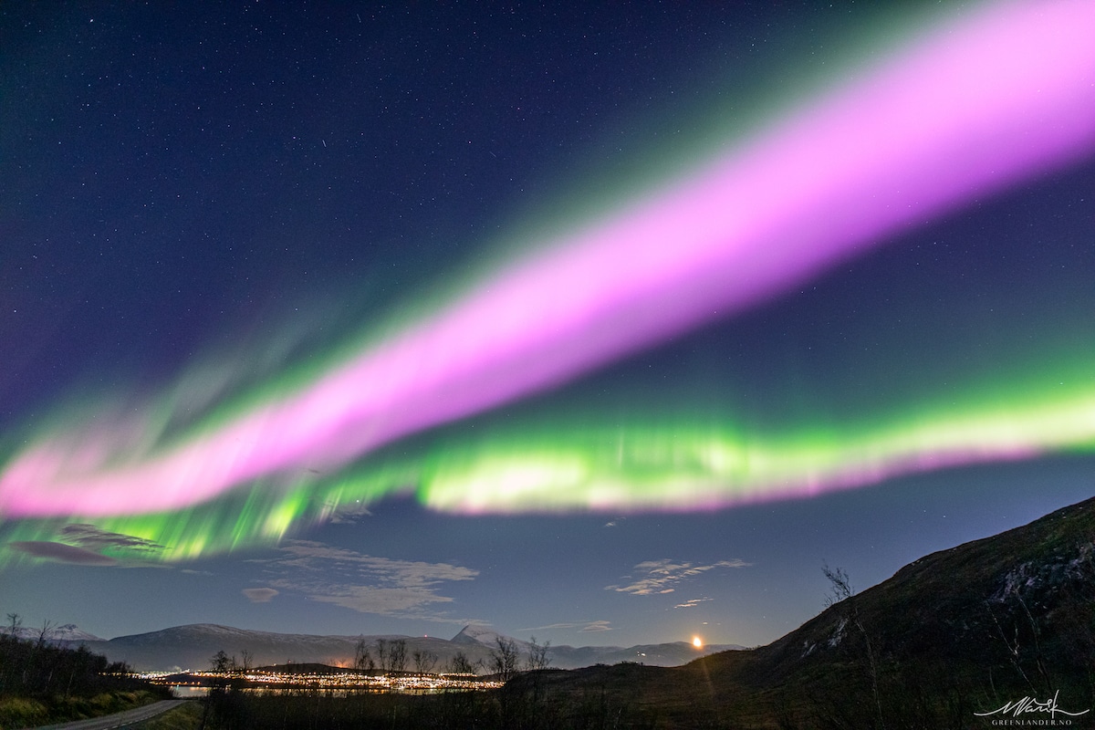 Solar Storm Causes Neon-Pink Northern Lights to Fill the Sky