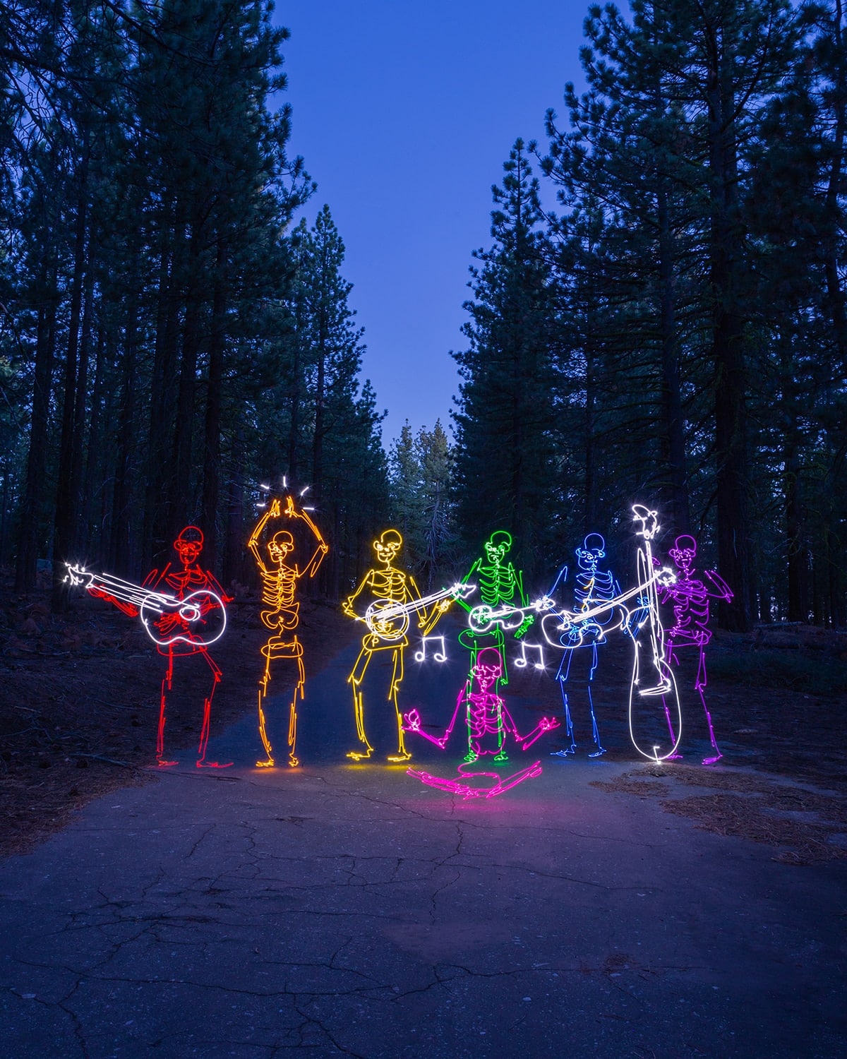 Rainbow Colored Light Painting of Skeletons by Darren Pearson