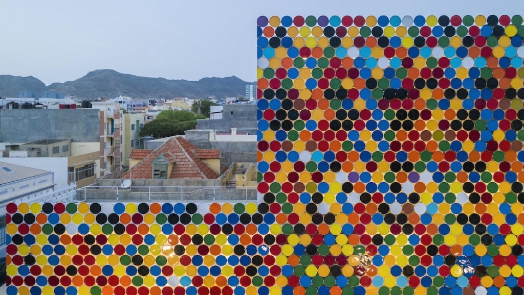 Unique Façade Created From Array of Recycled Barrel Lids
