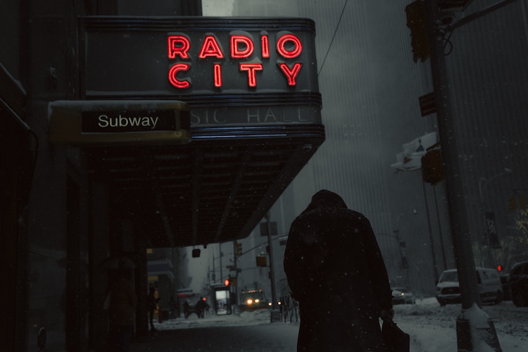 Man Walking by Radio City Music Hall