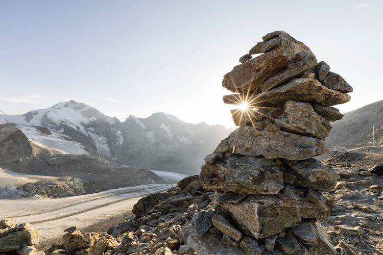 Cairn in Switzerland with a Mountain in the Background