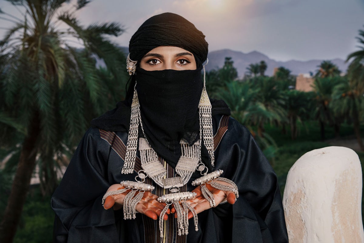 A girl in traditional dress in a region of Saudi Arabia.
