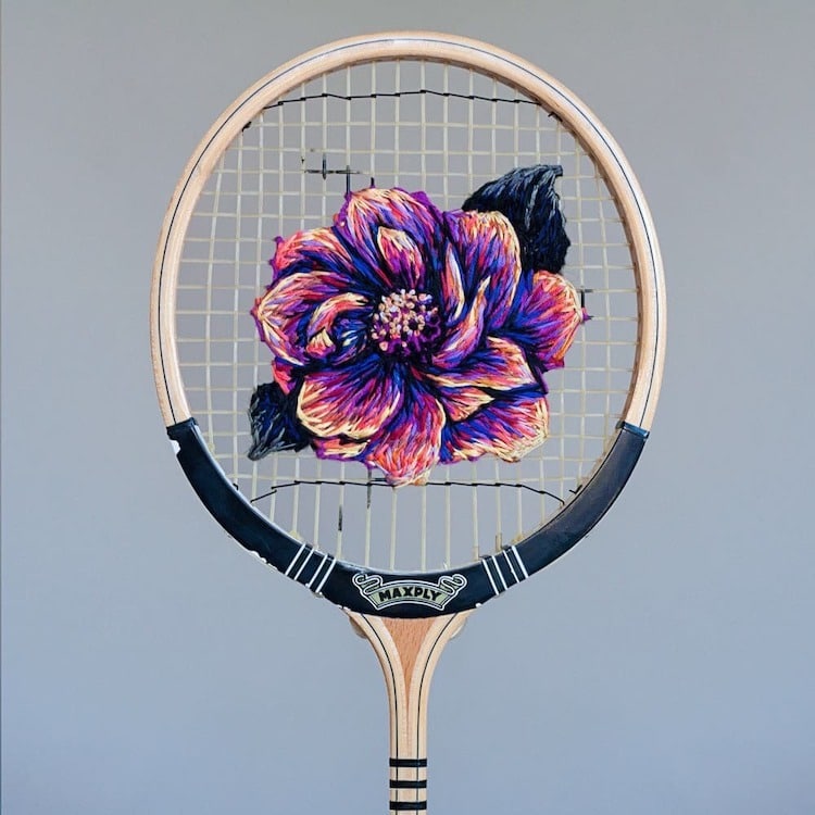 Embroidery by Danielle Clough on a Tennis Racket