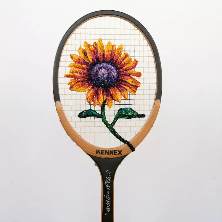 Embroidery by Danielle Clough on a Tennis Racket