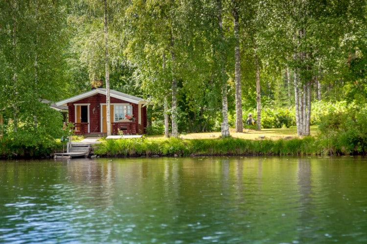 cabin in rural Finland surrounded by greenery