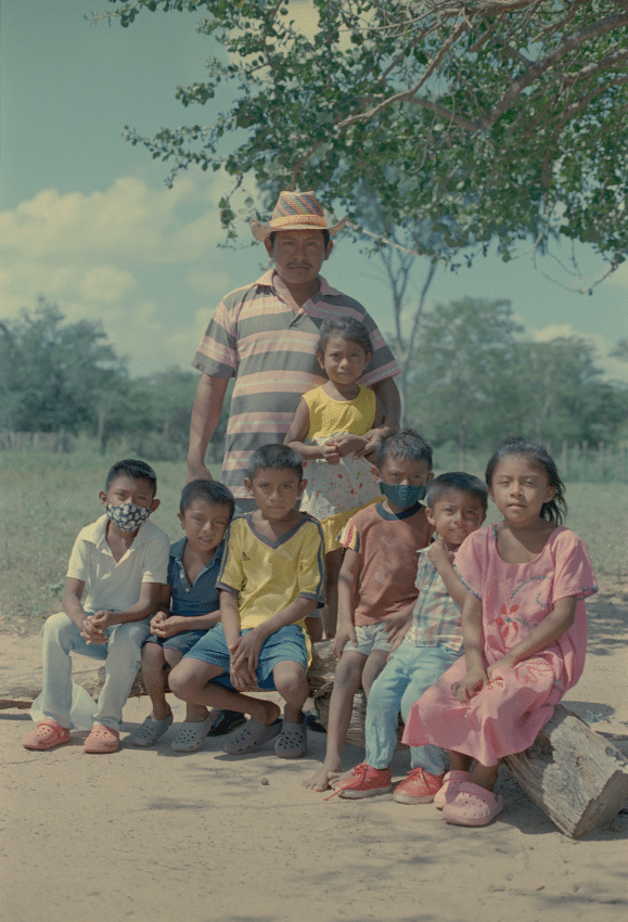 A group of Wayuu children in Polumacho with Emilio, the leader of the village