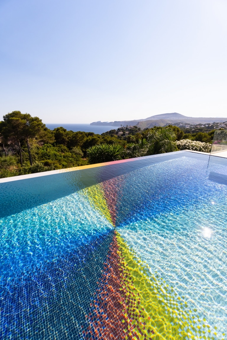 Rainbow Swimming Pool Features 130,000 Glass Mosaic Tiles