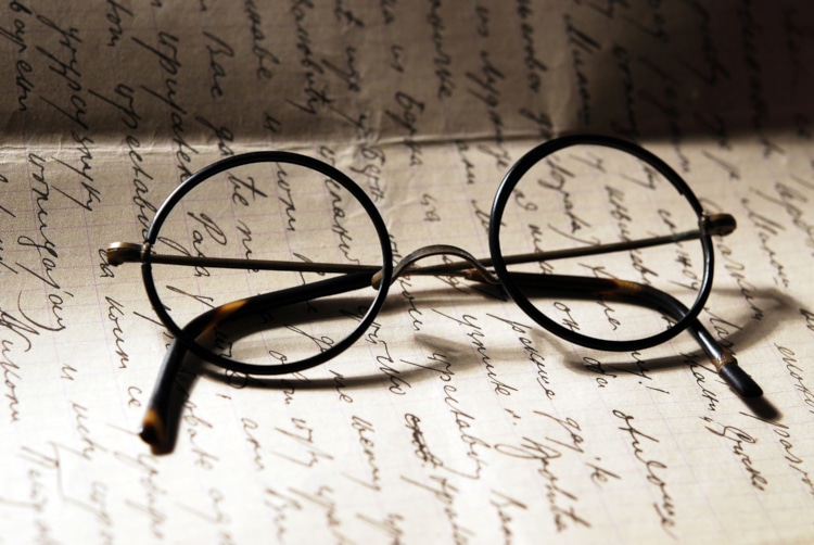 Harry Potter round glasses on written letter