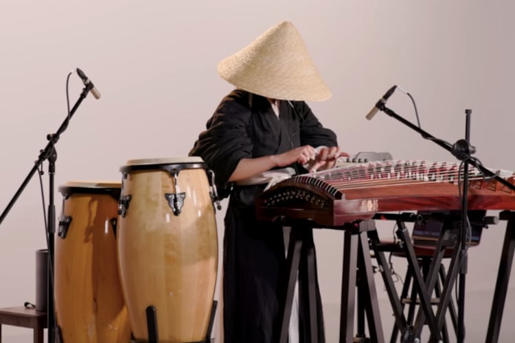 Musician Performing on a Guzheng