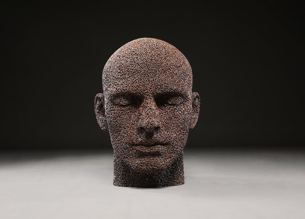 Massive Human Head Sculptures Made of Bicycle Chains Representing Our