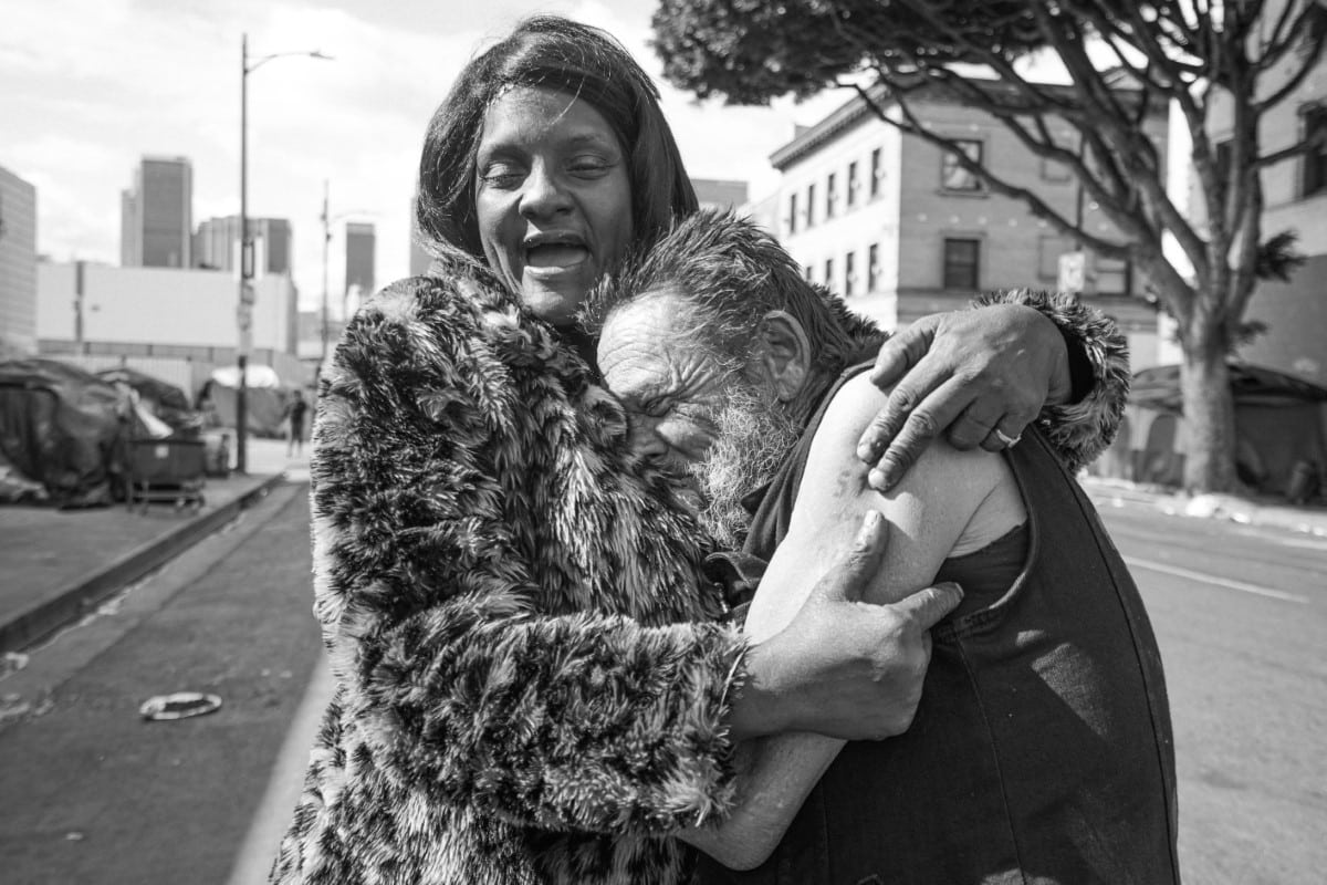 Couple Embracing on Skid Row