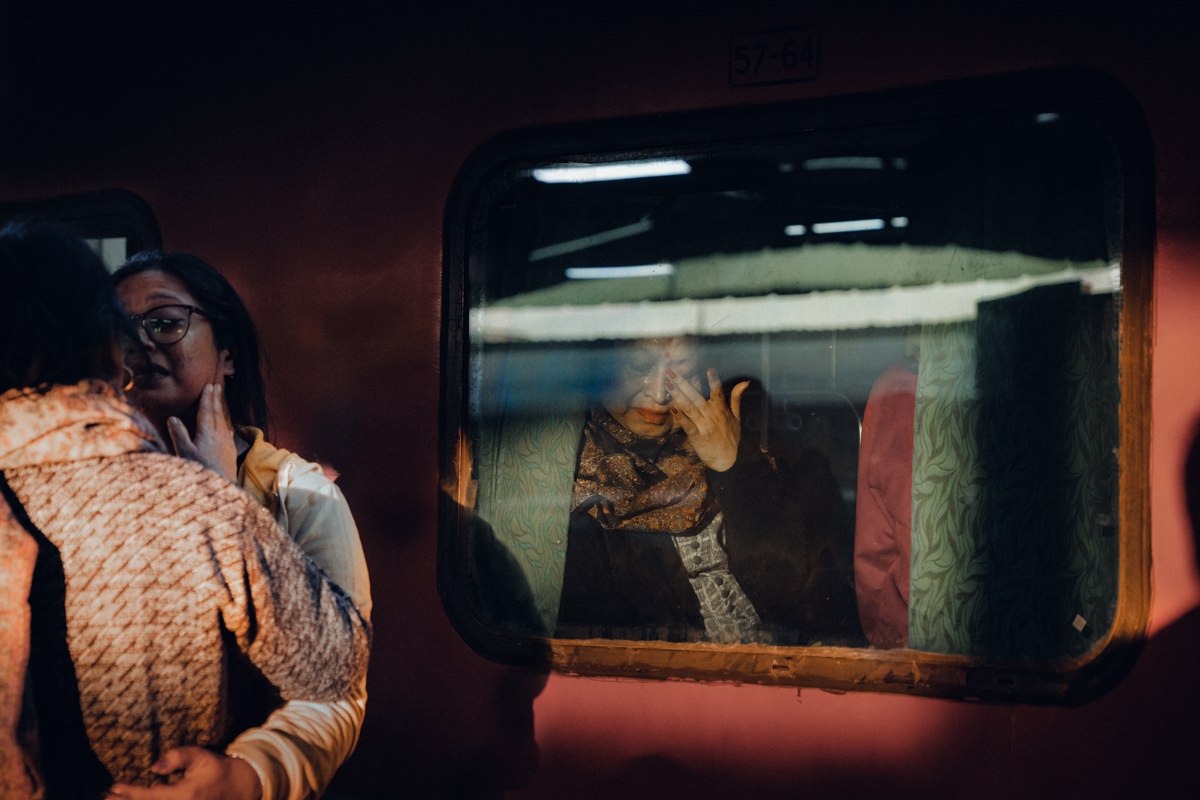 Woman Crying on a Train