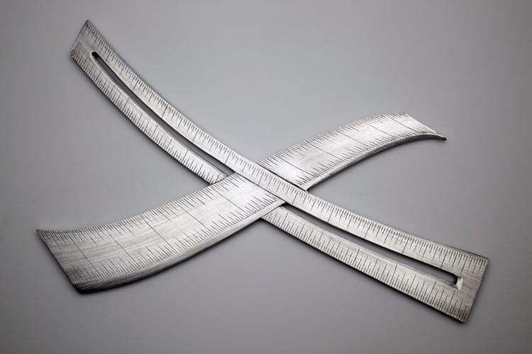 X-shaped custom made metal measuring instrument by Rick Salafia