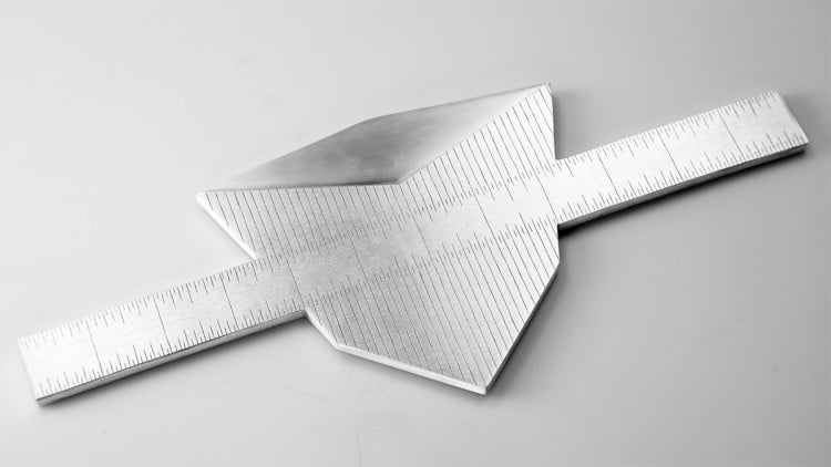 Shield-shaped custom metal measuring instrument