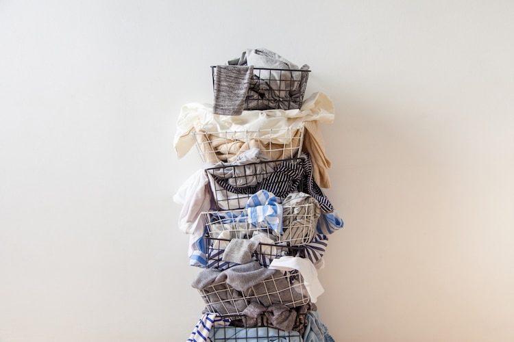 Clothes in Stacked Metal Baskets