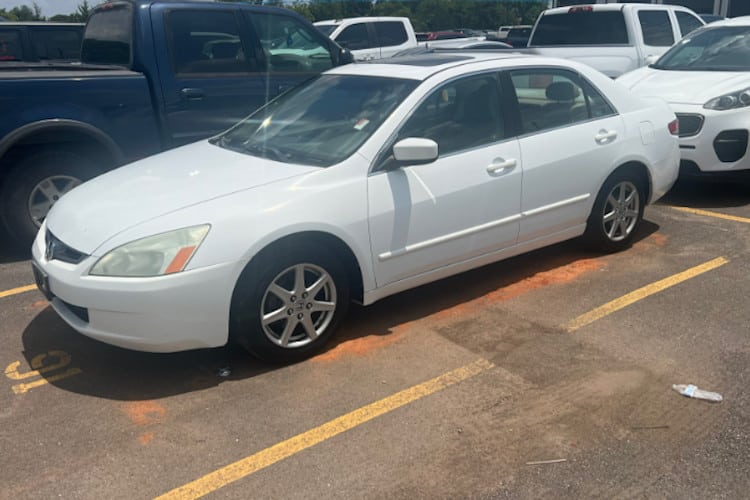 The car Mr. Troy, a custodian, got after a fundraiser