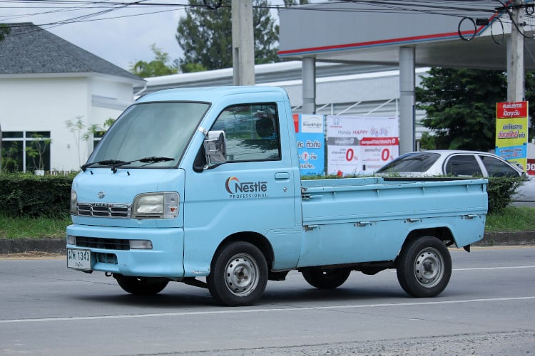 Blue Kei truck on the road