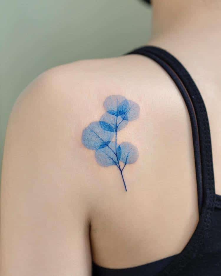 Ethereal Tattoo Designs Are Colored in Blue Ink