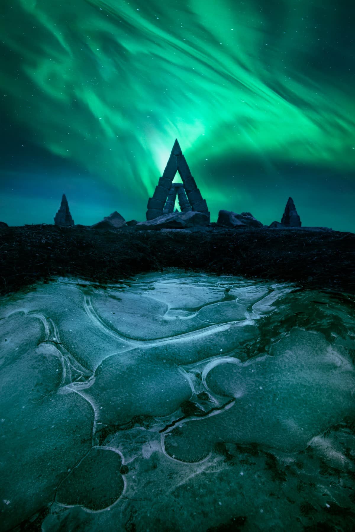 The Northern Lights over the mammoth sundial Arctic Henge