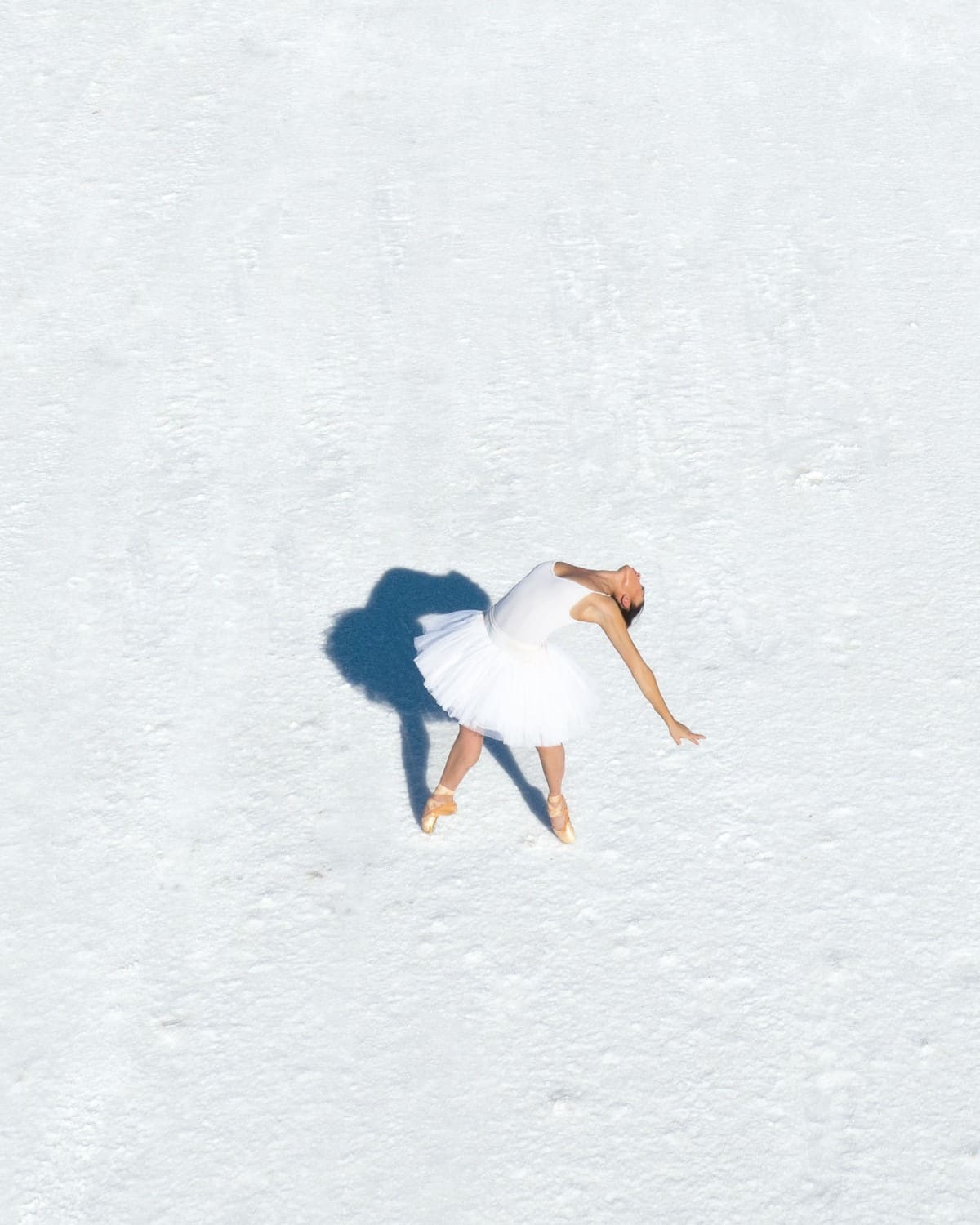 Ballet dancer Sasonah Huttenbach photographed by Brad Walls at Utah's Bonneville Salt Flats