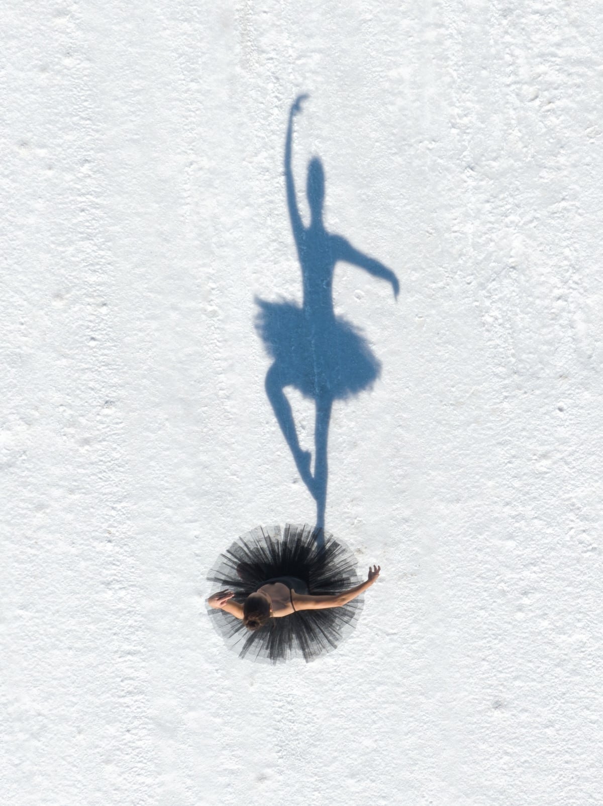 Ballet dancer Sasonah Huttenbach photographed by Brad Walls at Utah's Bonneville Salt Flats