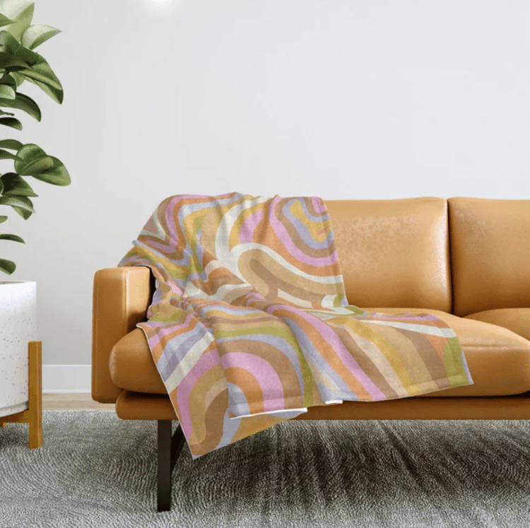 Multicolored Marble Pattern Throw Blanket On Brown Couch 