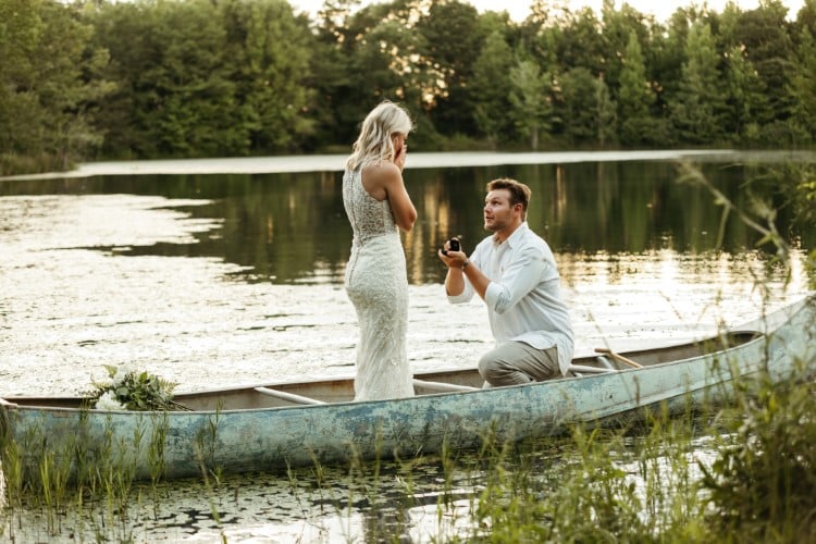 Couple Getting Engaged in a Canoe