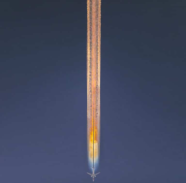 Rare Rainbow Contrails Emitted From Planes in the Sky
