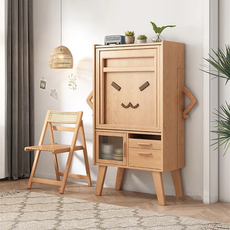 Wooden sideboard that holds a foldout table with chairs