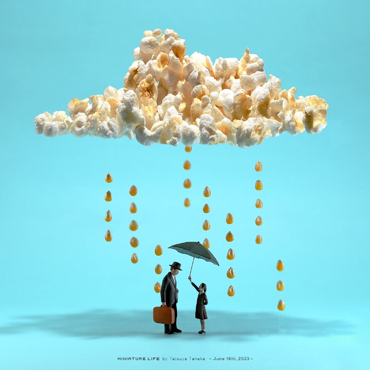 a cloud made of popcorn with kernels raining