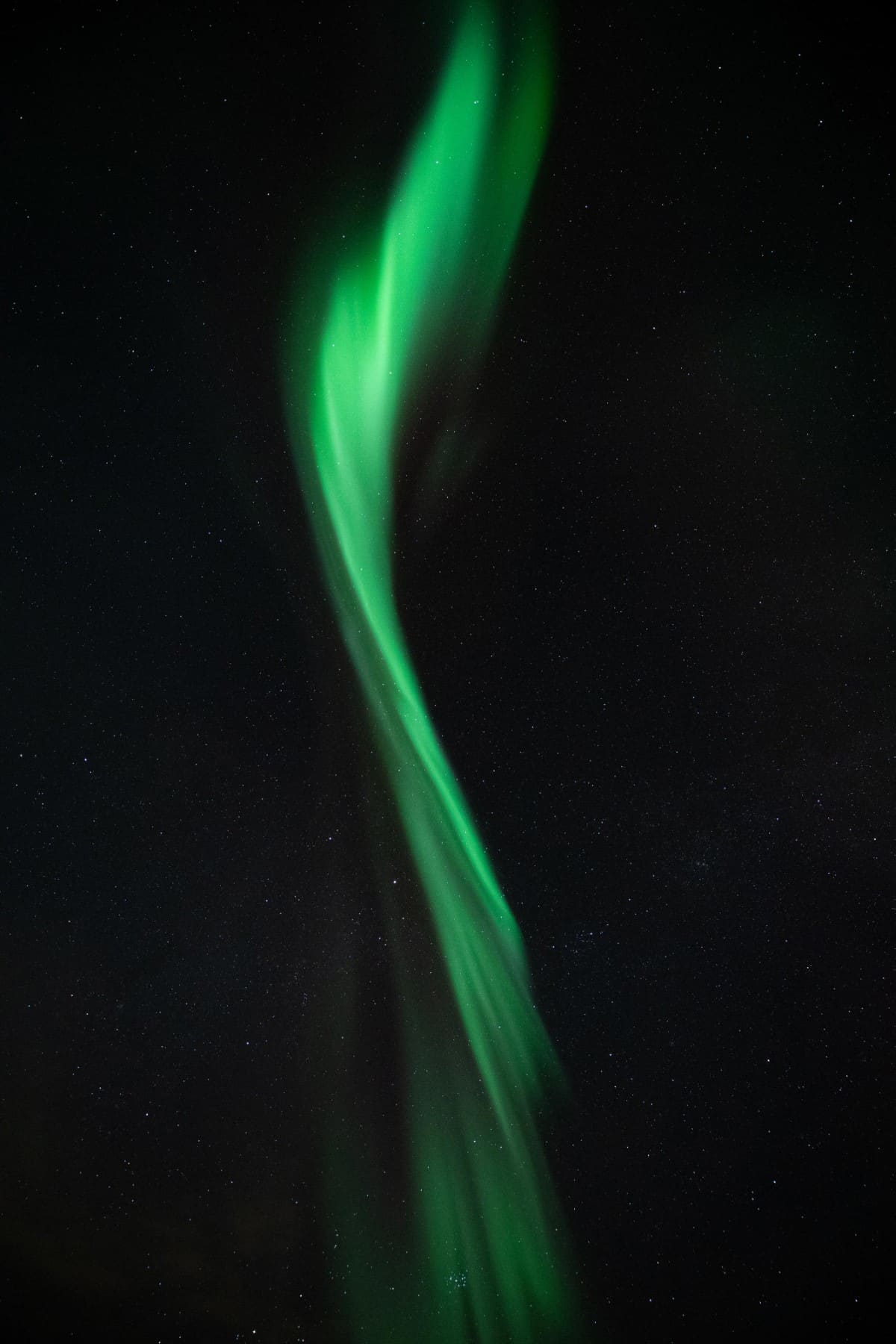 Abstract aurora in the shape of a brushstroke