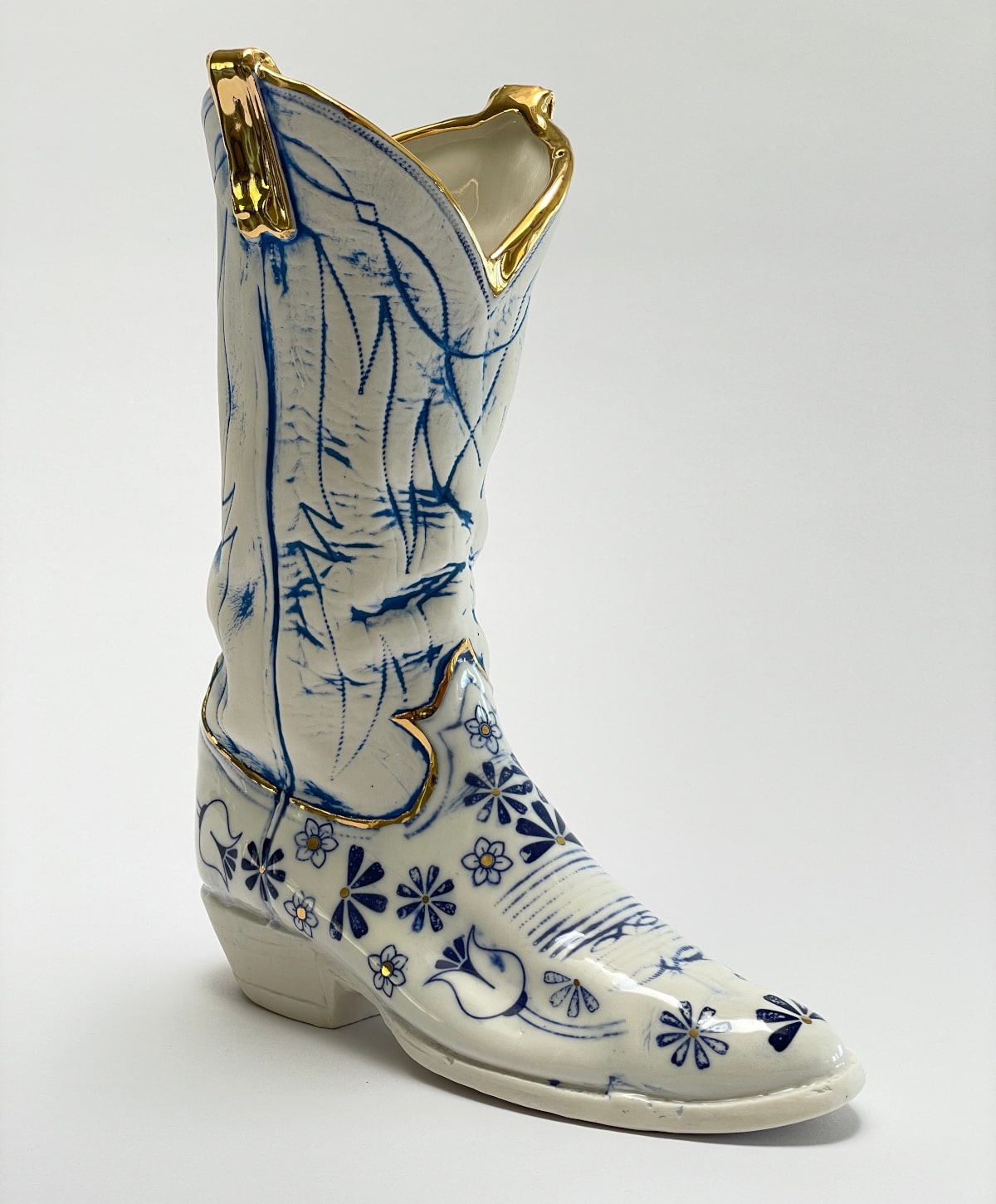 cowboy boots made of porcelain by Brock DeBoer