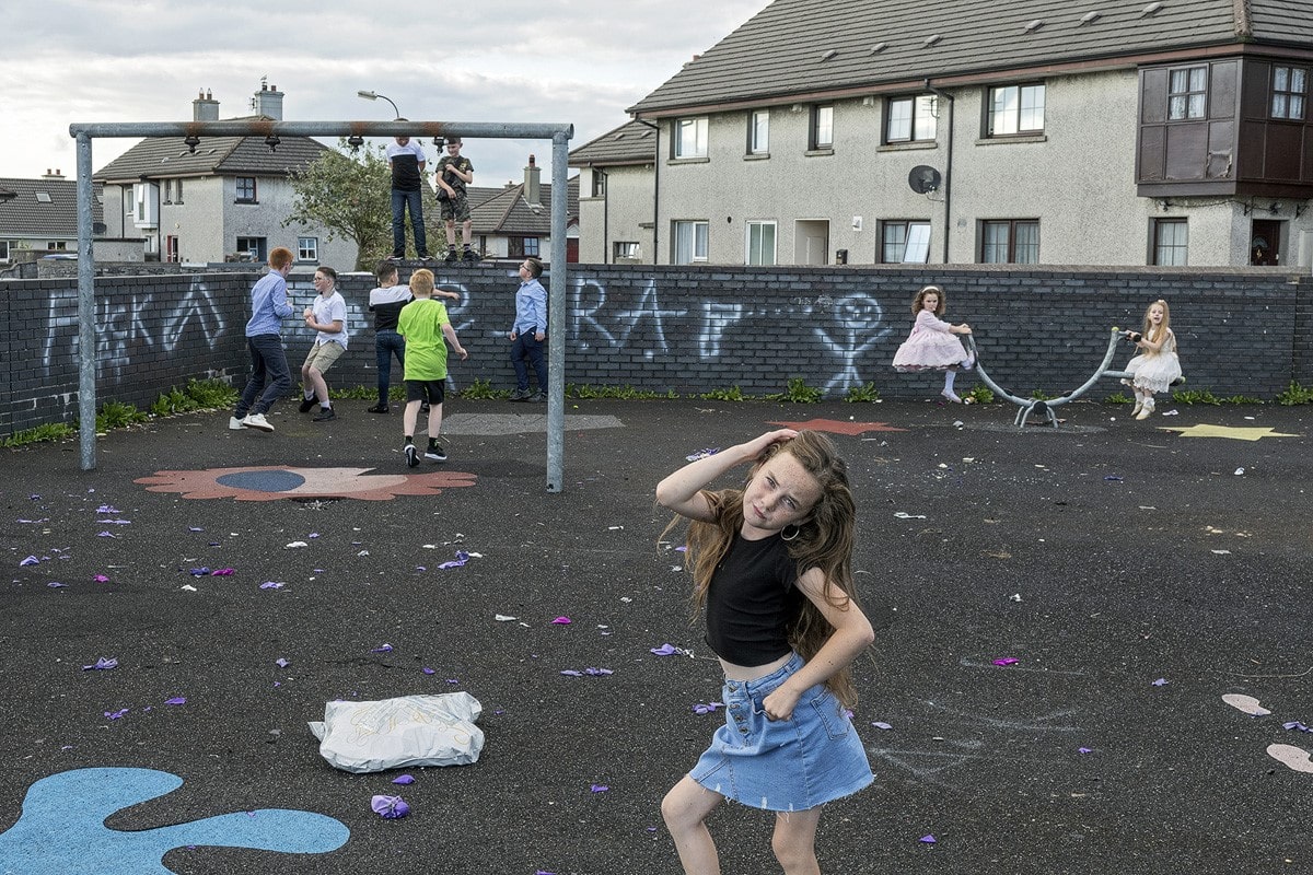 Traveler girl from Ireland posing for the camera at a playground