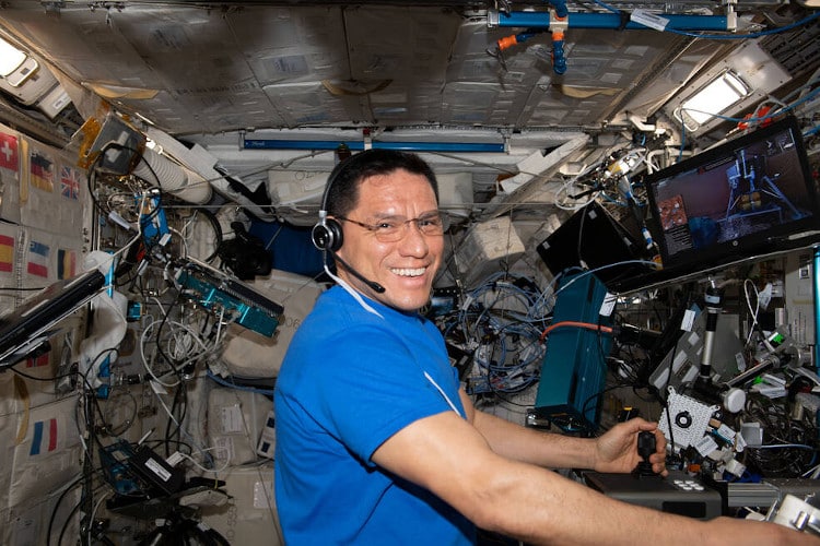 NASA astronaut and Expedition 69 Flight Engineer Frank Rubio poses for a portrait while working inside the International Space Station's Destiny laboratory module