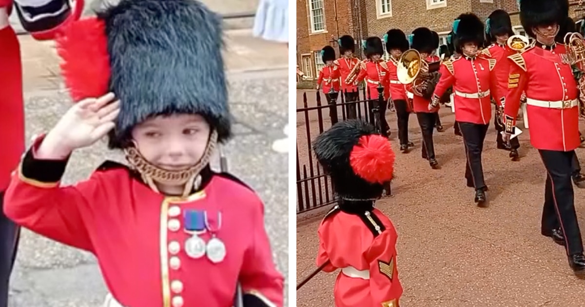 King's Guards Acknowledge a Young Boy Dressed in Costume