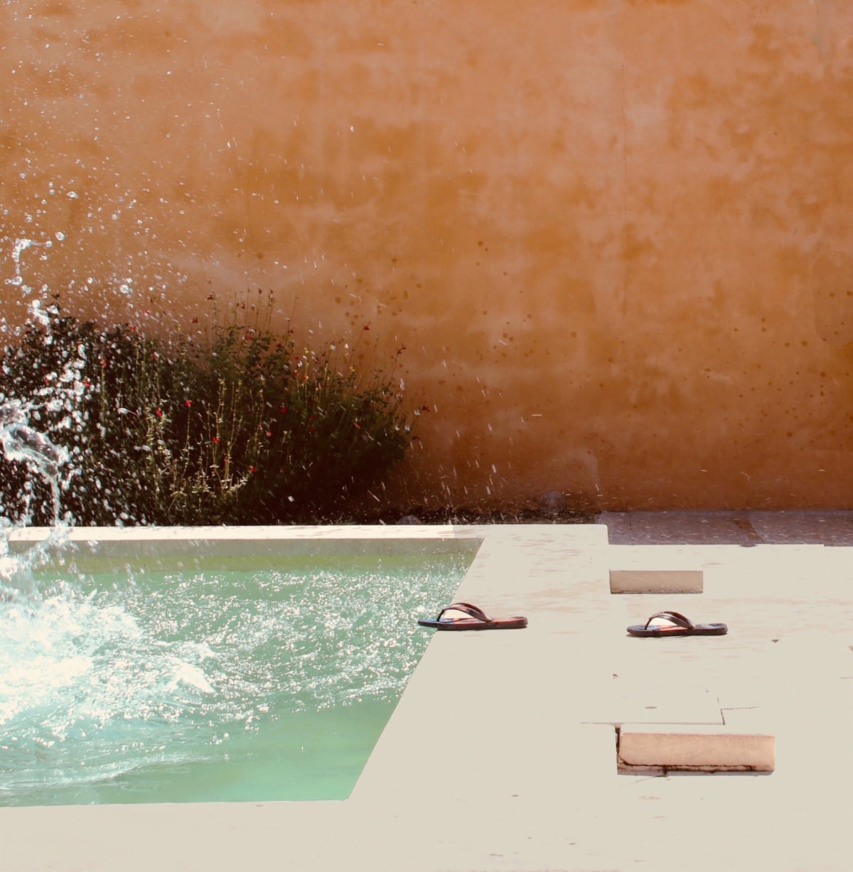 Person diving into a pool