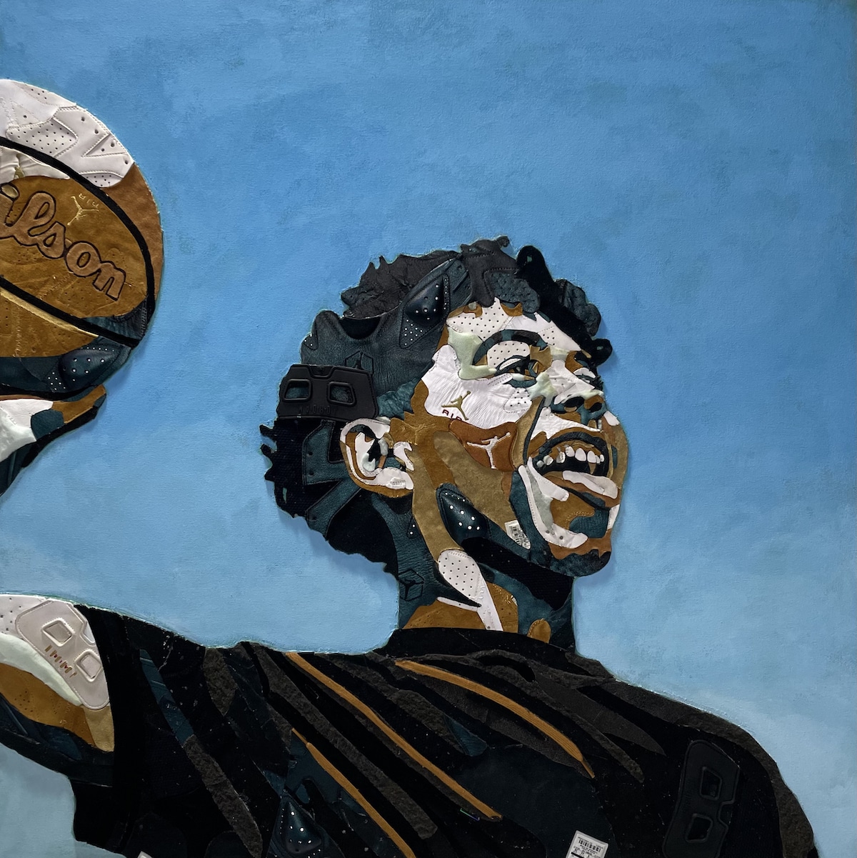 An example of Art Materialism - portrait of a young man playing basketball made of Air Jordan sneakers by artist Justin Ruby