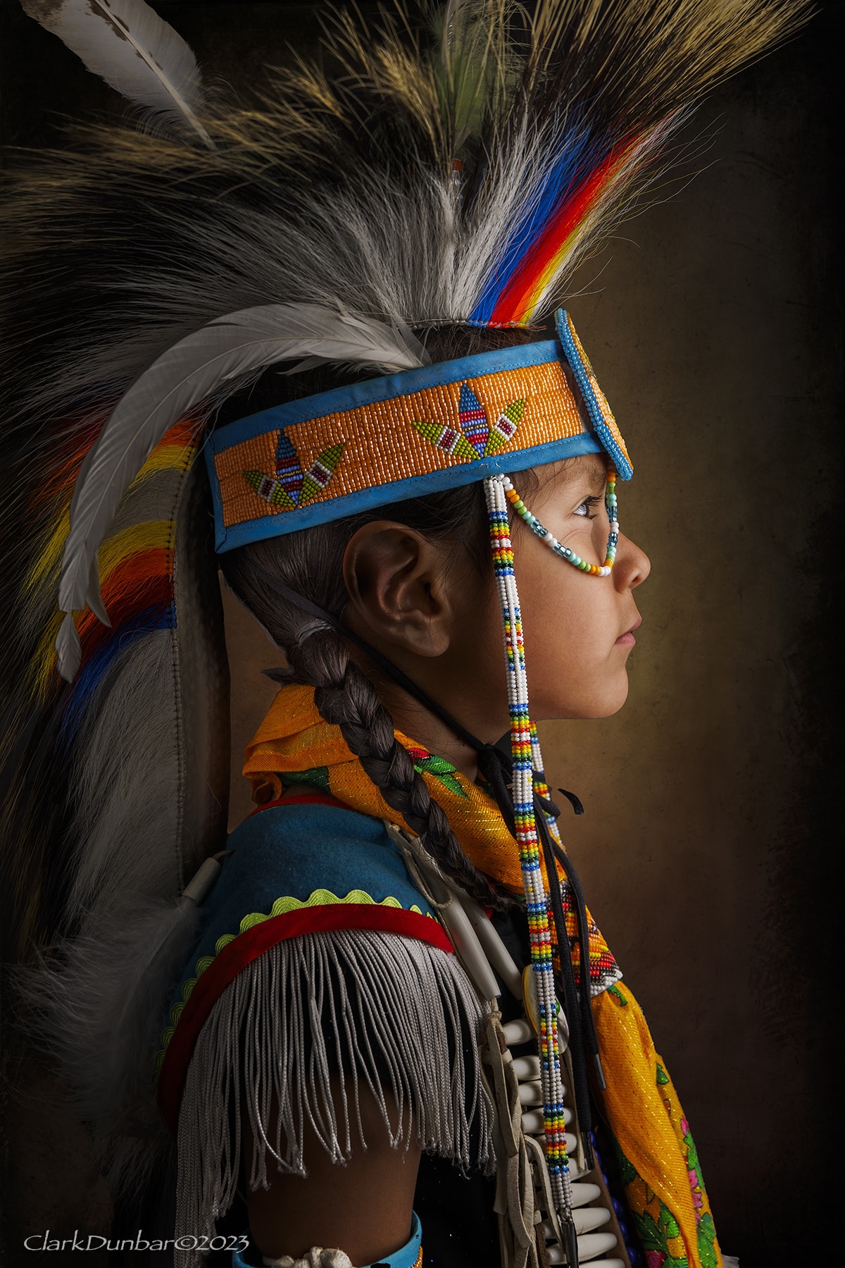 Portrait of a Native American boy in traditional dress